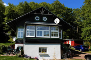 Гостиница Ferienwohnungen am Nationalpark  Зассниц